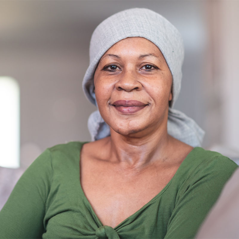 Portrait of a contemplative woman with cancer